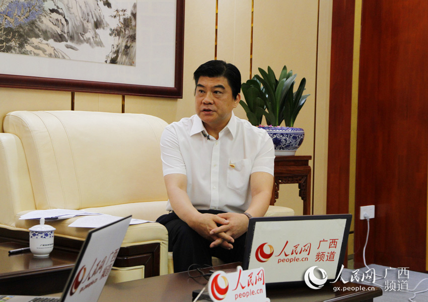 广西投资促进局局长,党组书记杨春庭接受人民网专访