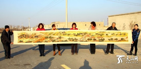 托克逊县妇女6年绣出7米长《清明上河图》 - A